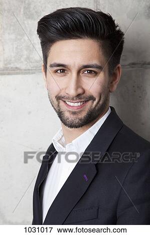 A cheerful businessman View Large Photo Image Stock Photo - A cheerful businessman. Fotosearch