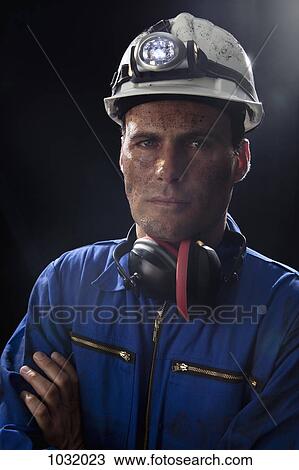 A coal miner with his arms crossed, portrait View Large Photo Image Stock Image - A coal miner with his arms crossed, portrait. Fotosearch