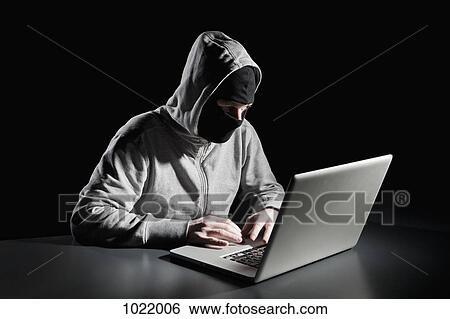 A computer hacker View Large Photo Image Stock Photograph - A computer hacker. Fotosearch