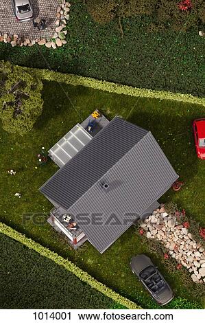 A diorama of miniature cars, people and a house, directly above View Large Photo Image Stock Image - A diorama of miniature cars, people and a house, directly above. Fotosearch