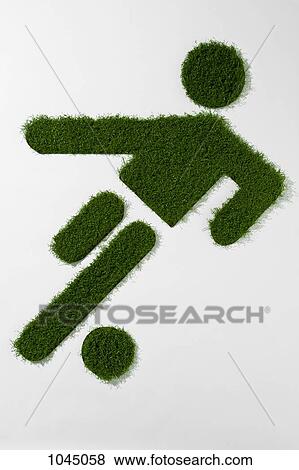 A grass figure playing soccer View Large Photo Image Stock Photo - A grass figure playing soccer . Fotosearch