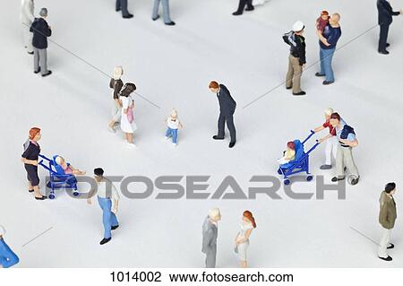 Stock Image - A group of miniature figurines . Fotosearch