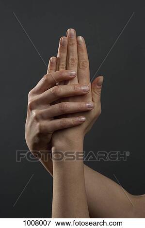 A hand holding another hand View Large Photo Image Stock Photo - A hand holding another hand. Fotosearch