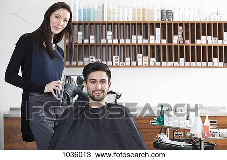 A happy customer in a hair salon View Large Photo Image Stock Image - A happy customer in a hair salon. Fotosearch