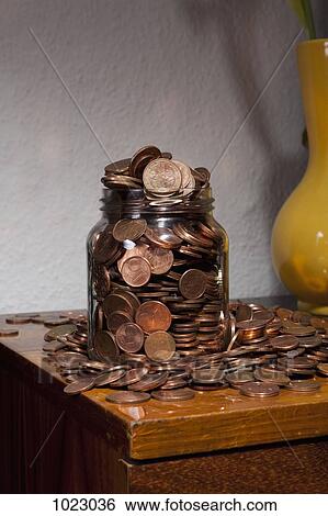 A jar overflowing with European Union coins View Large Photo Image Stock Photograph - A jar overflowing with European Union coins. Fotosearch