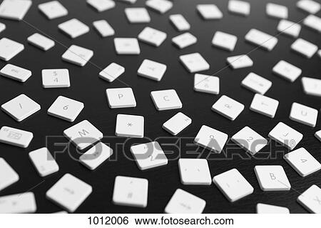 A large group of computer keys scattered on a black background View Large Photo Image Stock Photograph - A large group of computer keys scattered on a black background. Fotosearch