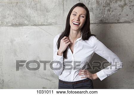 A laughing businesswoman View Large Photo Image Stock Image - A laughing businesswoman. Fotosearch