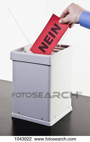 A man putting a ballot with the word NEIN written on it into a ballot box, close-up hands View Large Photo Image Stock Image - A man putting a ballot with the word NEIN written on it into a ballot box, close-up hands. Fotosearch