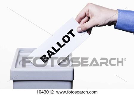 A man putting a paper with the word BALLOT written on it into a ballot box, close-up hands View Large Photo Image Stock Image - A man putting a paper with the word BALLOT written on it into a ballot box, close-up hands. Fotosearch