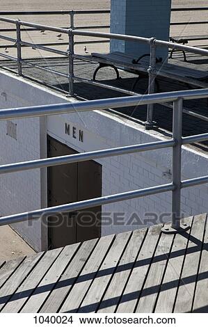 A men's public restroom on the beach at Coney Island, USA View Large Photo Image Picture - A men's public restroom on the beach at Coney Island, USA. Fotosearch