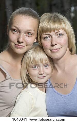 A mother and her two daughters, portrait View Large Photo Image Stock Image - A mother and her two daughters, portrait. Fotosearch