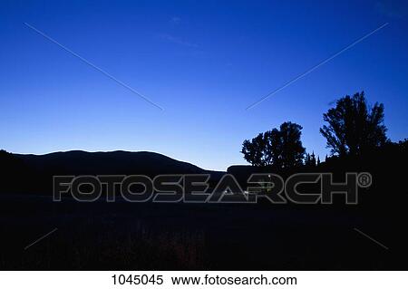 Stock Photography - A rural scene at dusk. Fotosearch