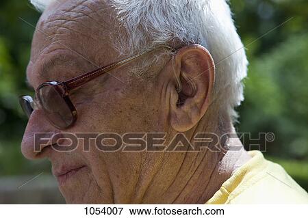 A senior man looking contemplative, close-up View Large Photo Image Stock Photo - A senior man looking contemplative, close-up. Fotosearch