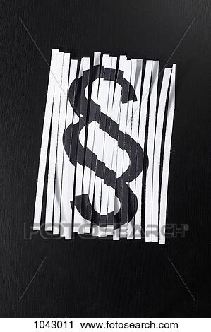Stock Image - A shredded document with a legal system section sign on it. Fotosearch