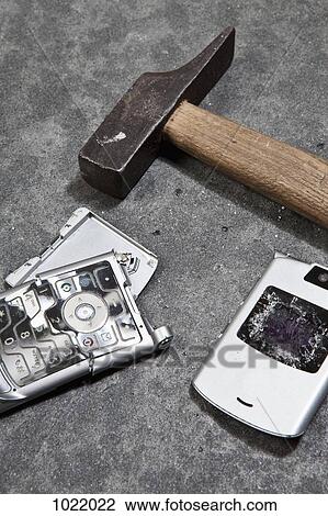 A smashed mobile phone and hammer View Large Photo Image Stock Image - A smashed mobile phone and hammer. Fotosearch