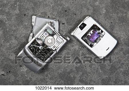 Picture - A smashed mobile phone. Fotosearch