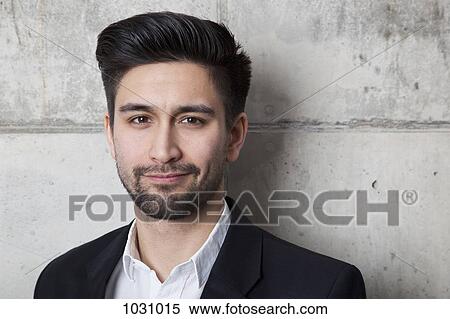 Stock Photography - A smiling businessman, head and shoulders. Fotosearch