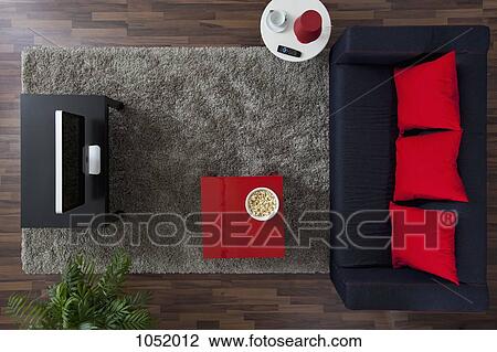 A sofa, TV and side table with a bowl of popcorn, overhead view View Large Photo Image Stock Image - A sofa, TV and side table with a bowl of popcorn, overhead view. Fotosearch