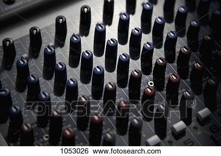 A sound mixing board, close-up, full frame View Large Photo Image Stock Photograph - A sound mixing board, close-up, full frame. Fotosearch