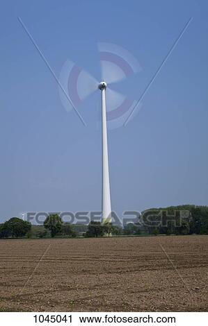 A spinning wind turbine View Large Photo Image Stock Image - A spinning wind turbine. Fotosearch