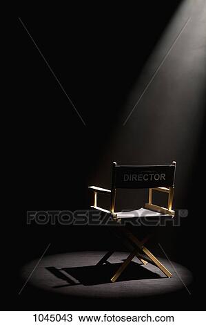 A spot lit directors chair View Large Photo Image Stock Image - A spot lit directors chair. Fotosearch