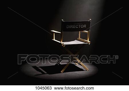 A spot lit directors chair View Large Photo Image Stock Image - A spot lit directors chair. Fotosearch