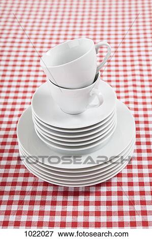 A stack of plates, saucers and coffee cups View Large Photo Image Stock Photo - A stack of plates, saucers and coffee cups. Fotosearch
