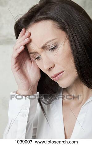 A stressed looking woman, close-up, portrait View Large Photo Image Stock Photo - A stressed looking woman, close-up, portrait. Fotosearch