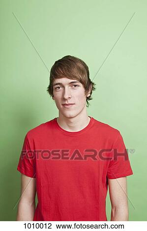 A teenage boy, portrait, studio shot View Large Photo Image Stock Image - A teenage boy, portrait, studio shot. Fotosearch
