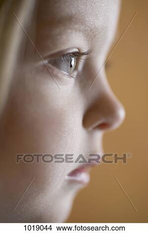 A toddler looking away, profile, close-up View Large Photo Image Picture - A toddler looking away, profile, close-up. Fotosearch