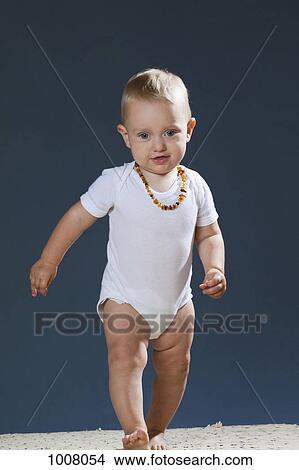 A toddler walking View Large Photo Image Picture - A toddler walking. Fotosearch