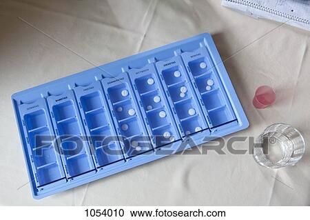 A weekly pill organizer View Large Photo Image Stock Image - A weekly pill organizer. Fotosearch
