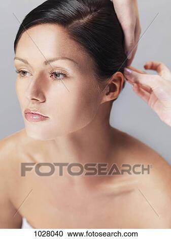 A woman getting her hair styled View Large Photo Image Stock Image - A woman getting her hair styled. Fotosearch