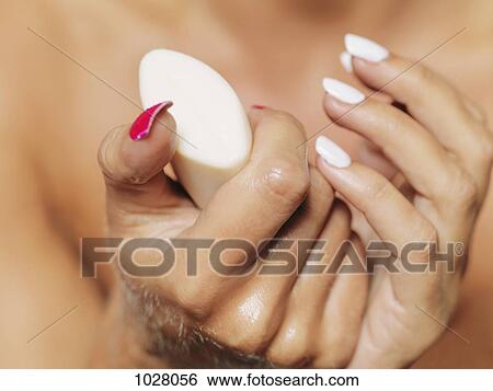 A woman washing her hands, close-up of hands View Large Photo Image Stock Photograph - A woman washing her hands, close-up of hands. Fotosearch