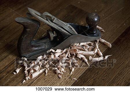 A wood planing tool and shavings View Large Photo Image Stock Photo - A wood planing tool and shavings. Fotosearch