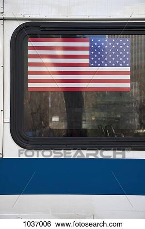 American flag on a bus window View Large Photo Image Stock Photograph - American flag on a bus window. Fotosearch