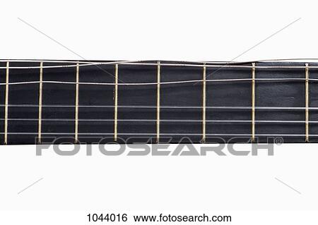 An acoustic guitar fretboard with a damaged string, close-up View Large Photo Image Stock Photograph - An acoustic guitar fretboard with a damaged string, close-up. Fotosearch