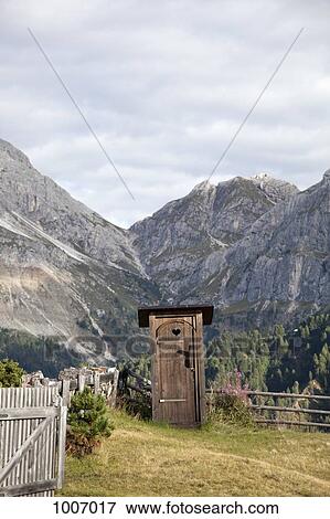 An outhouse in a mountain setting View Large Photo Image Stock Photo - An outhouse in a mountain setting. Fotosearch