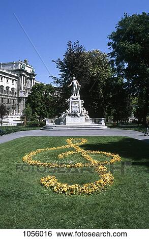 Austria, Vienna, Mozart statue in Burggarten Park and a floral treble clef in foreground View Large Photo Image Stock Photograph - Austria, Vienna, Mozart statue in Burggarten Park and a floral treble clef in foreground. Fotosearch