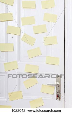 Blank adhesive notes attached to a front door View Large Photo Image Stock Image - Blank adhesive notes attached to a front door. Fotosearch