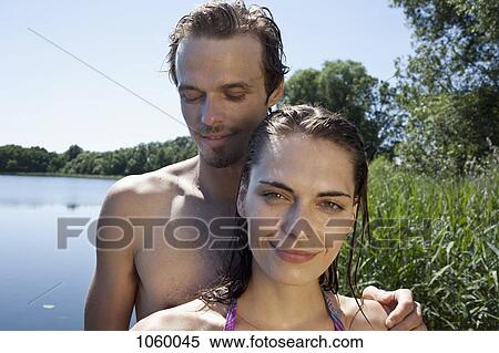 Boyfriend and girlfriend by the lake View Large Photo Image Stock Photography - Boyfriend and girlfriend by the lake. Fotosearch