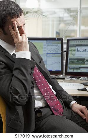 Businessman feels pressure View Large Photo Image Stock Photo - Businessman feels pressure. Fotosearch