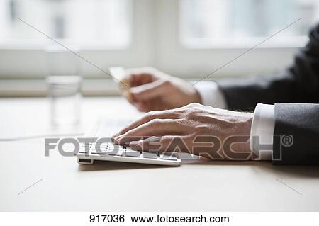 Businessman hands typing View Large Photo Image Stock Photograph - Businessman hands typing. Fotosearch