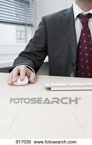 Businessman with mouse View Large Photo Image Stock Photography - Businessman with mouse. Fotosearch