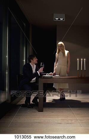 Couple have romantic dinner in apartment. View Large Photo Image Stock Photography - Couple have romantic dinner in apartment.. Fotosearch