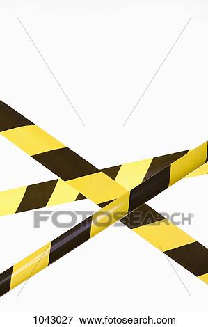 Crisscrossed yellow and black striped cordon tape View Large Photo Image Stock Photo - Crisscrossed yellow and black striped cordon tape. Fotosearch