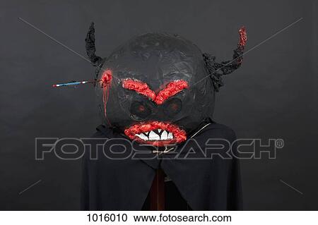 Dark Halloween mask and black cape. View Large Photo Image Stock Image - Dark Halloween mask and black cape.. Fotosearch