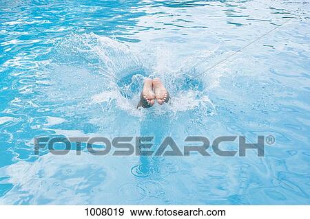 Detail of a boy diving into a swimming pool View Large Photo Image Stock Photo - Detail of a boy diving into a swimming pool. Fotosearch