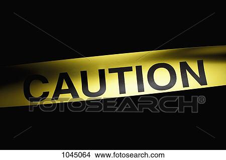 Detail of CAUTION cordon tape View Large Photo Image Picture - Detail of CAUTION cordon tape. Fotosearch