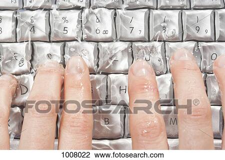Detail of hands typing on a laptop underwater View Large Photo Image Stock Image - Detail of hands typing on a laptop underwater. Fotosearch